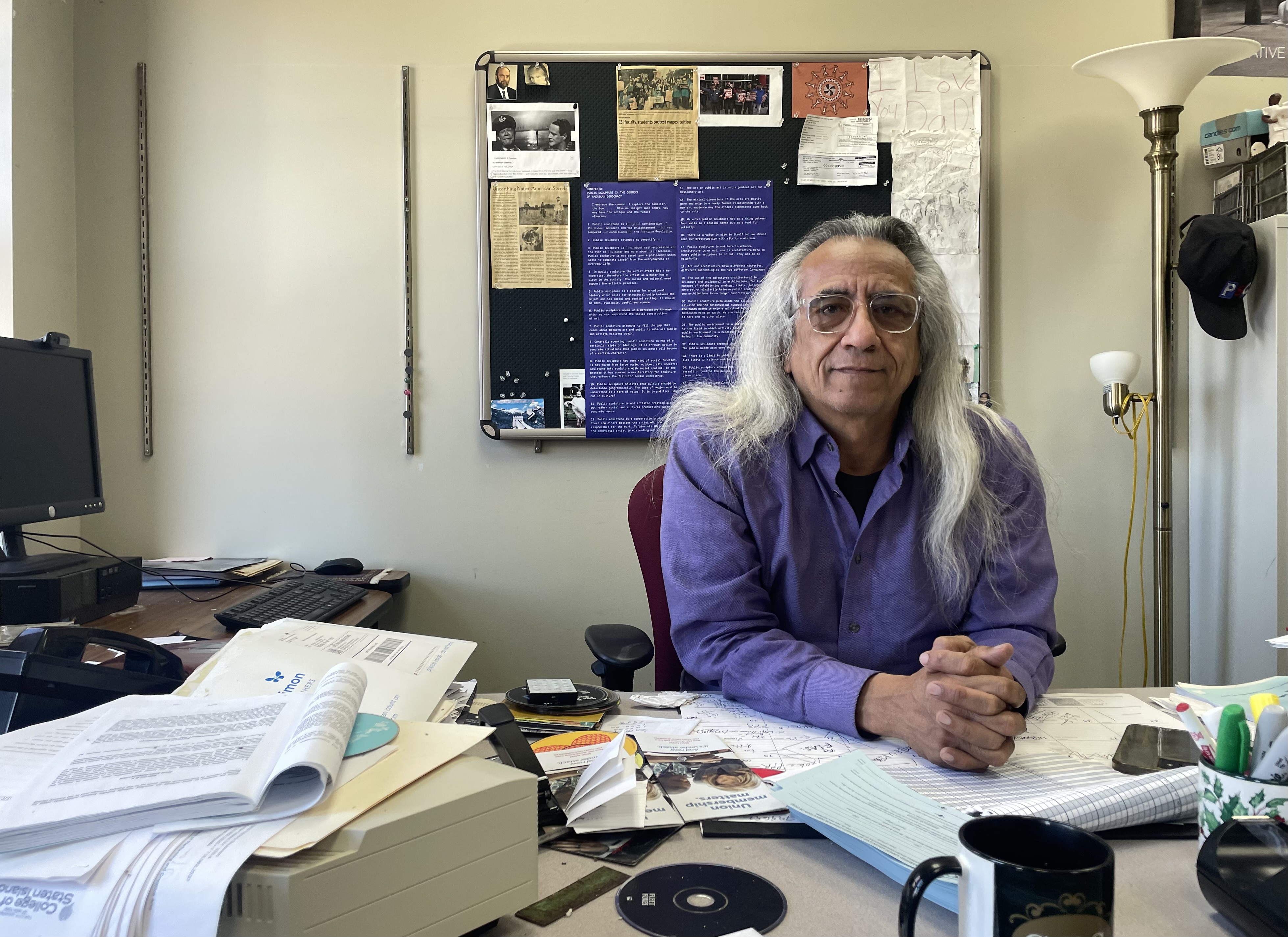 College Professor By Day, One-Man Show By Night 
